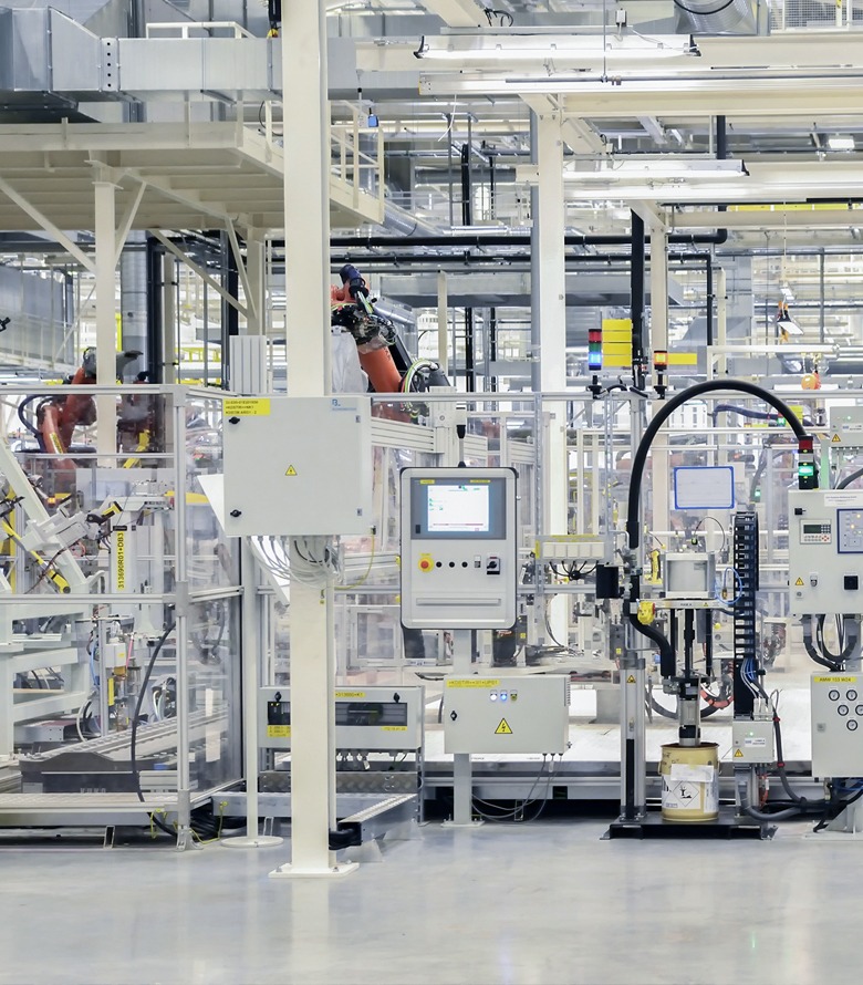 80/20 T-slot aluminum automotive material handling solutions featuring flow racks, kitting carts, end-of-arm tooling, and maintenance fixtures for lean manufacturing and assembly operations.