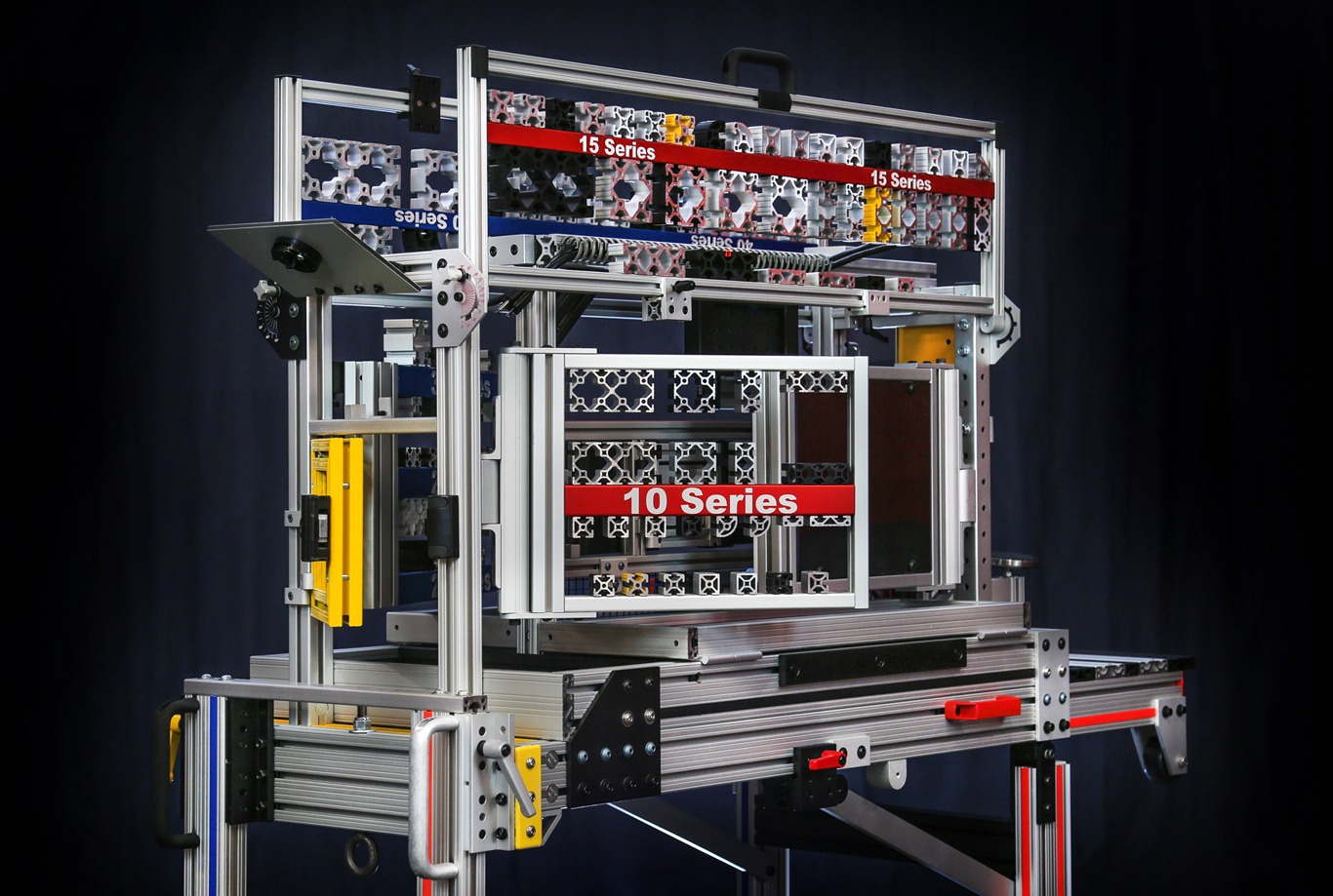 Demonstration fixture displaying 10 Series and 15 Series T-slot aluminum extrusion profiles on an industrial framing system.