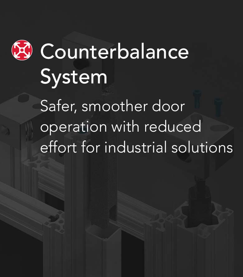 Industrial counterbalance system integrated into aluminum extrusion profiles, featuring pulleys and weights for effortless vertical door movement.