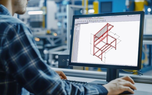 CAD software displaying a modular aluminum T‑slot framing structure used for engineering design and product development