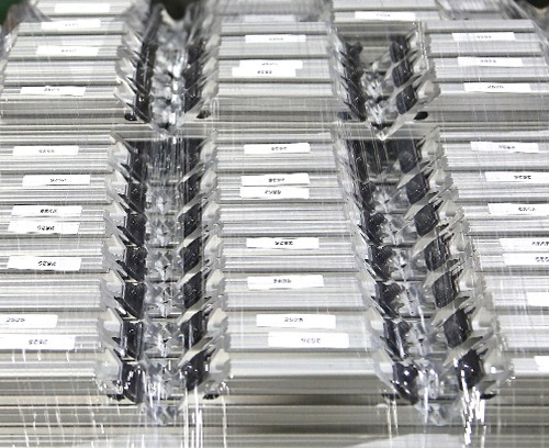 Individually labeled 80/20 T-slot aluminum profiles bundled and packaged for custom orders, ensuring accurate identification, inventory control, and efficient assembly and shipping.