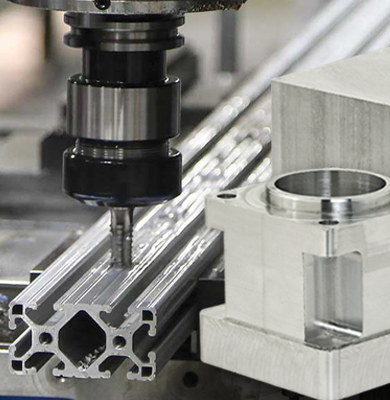 Machining process creating custom aluminum components for 80/20 T-slot aluminum applications.