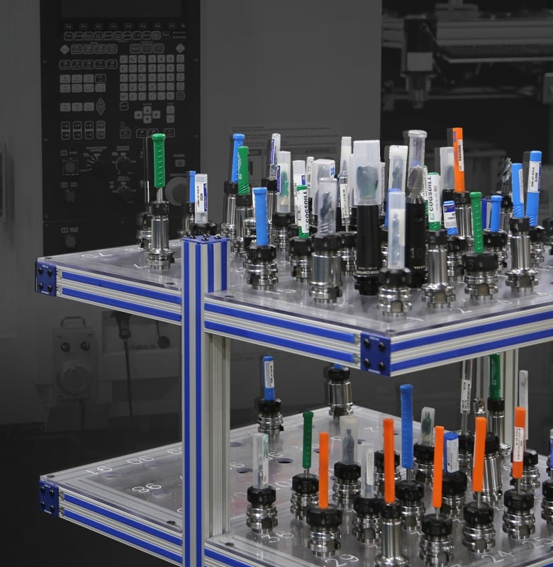 Industrial CNC tool storage cart with organized tool holders, cutting tools, and aluminum extrusion framing designed for tool management, production efficiency, and manufacturing operations.