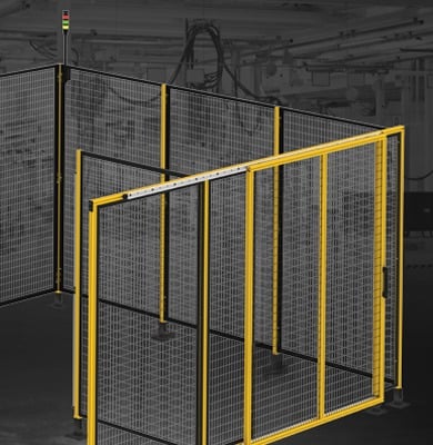 Robotic Cell Machine Guarding and Industrial Safety Fencing System Industrial robotic cell enclosed with machine guarding safety fencing, access doors, and aluminum framing designed to protect personnel and ensure compliance in automated manufacturing environments.