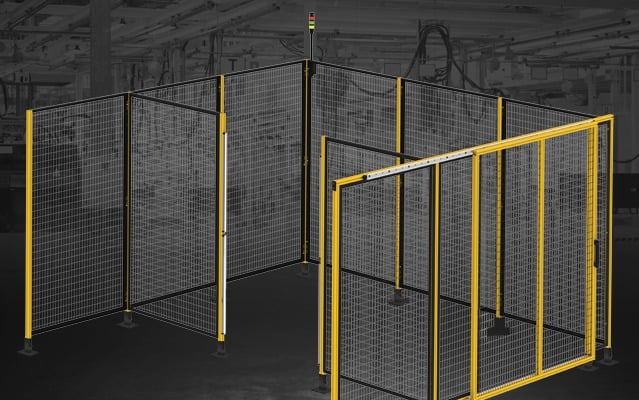 Robotic Cell Machine Guarding and Industrial Safety Fencing System Industrial robotic cell enclosed with machine guarding safety fencing, access doors, and aluminum framing designed to protect personnel and ensure compliance in automated manufacturing environments.