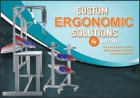 Front cover of the 80/20 Custom Ergonomic Solutions booklet, featuring a T-slot aluminum industrial workstation and a mobile tool cart with red and blue storage bins.