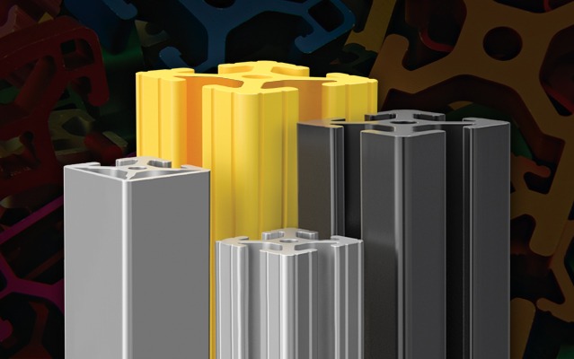 Four upright T-slot aluminum extrusion profiles displaying different metal finishing options, including clear anodized, black anodized, and a vibrant yellow powder coating. A variety of colorful, cross-sectional profiles are blurred in the background to s