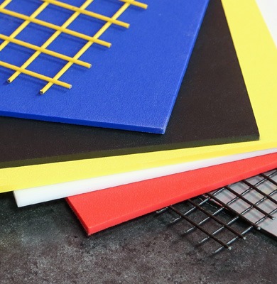 A selection of panels destined for an 80/20 T-slot aluminum enclosure, illustrating custom fabrication capabilities for industrial guarding and works