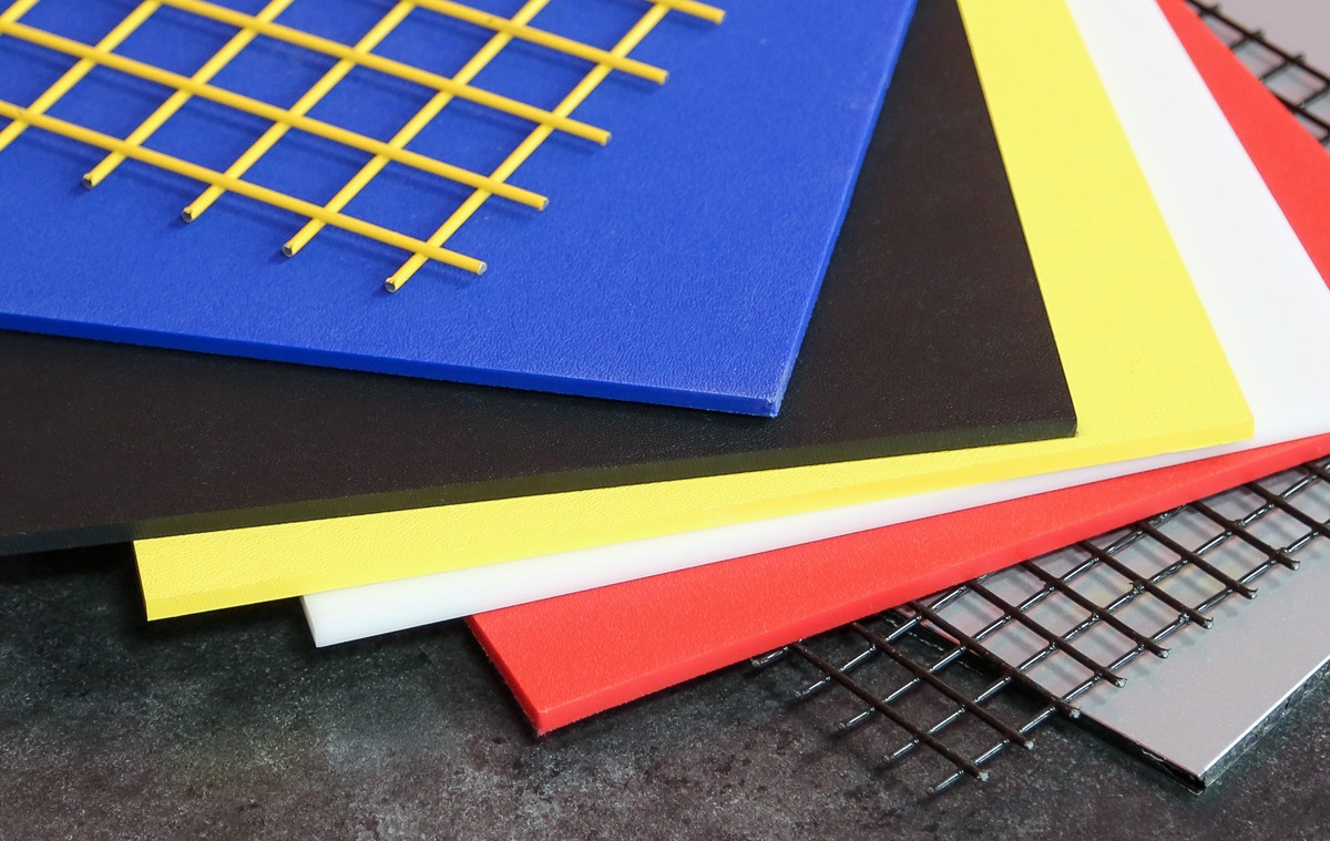 Selection of custom panel materials and wire mesh for 80/20 T-slot aluminum framing systems, including colored plastic panels and welded wire mesh for machine guarding, workstations, and industrial enclosures.