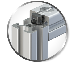 80/20 Modular T-Slot Aluminum Extrusion Connection Close-up of an 80/20 modular T-slot aluminum extrusion connection with fastening hardware for adjustable industrial framing systems.