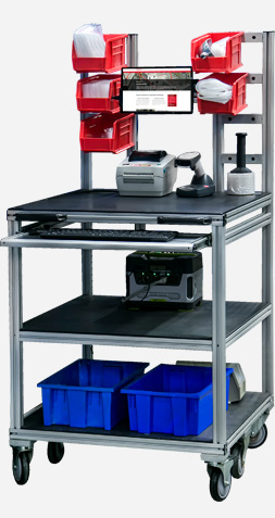 Mobile aluminum framing cart equipped with shelves, storage bins, and a workstation setup.