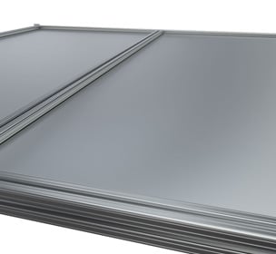 Modular aluminum panel with grooved framing edges.